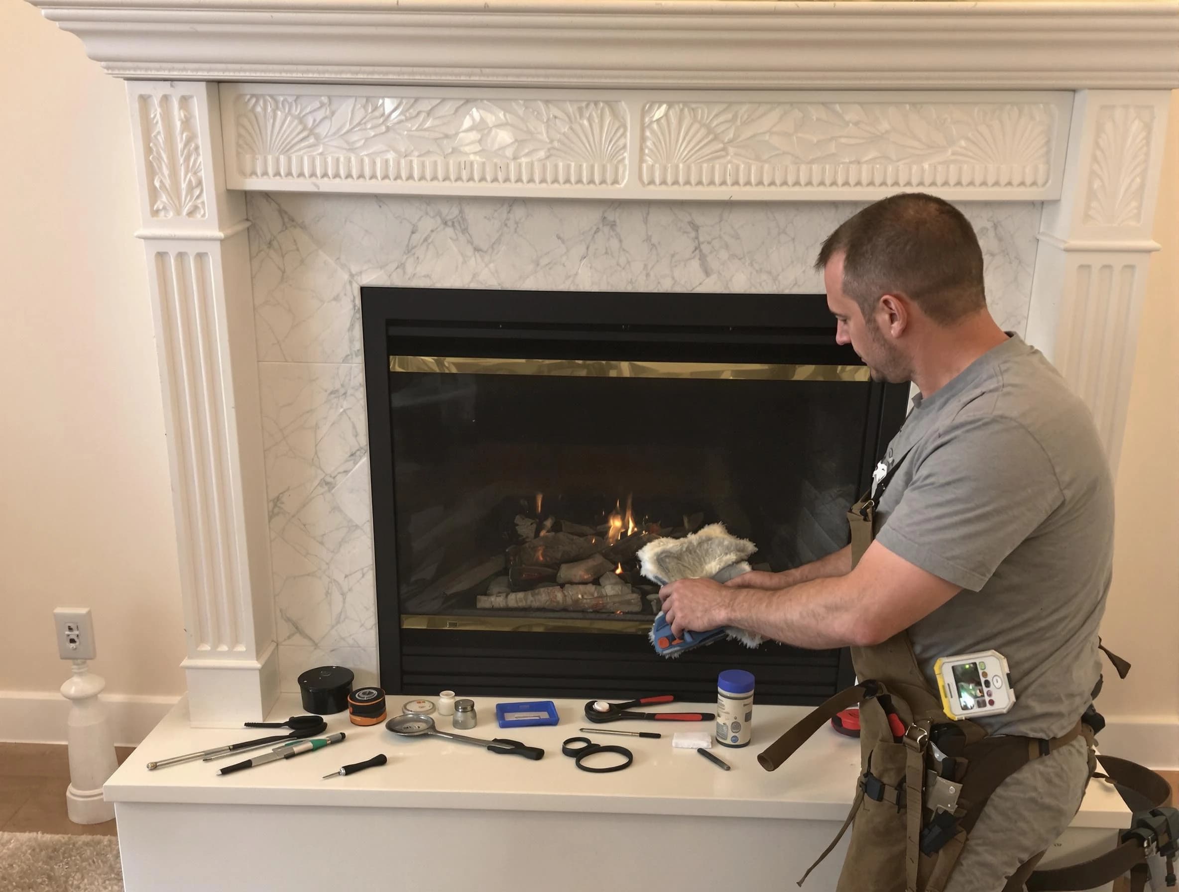 Lacey Chimney Sweep performing fireplace maintenance in Lacey, NJ